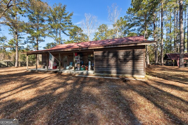328 Willow Creek Rd, Folkston, GA 31537 - rear view of house with metal roof