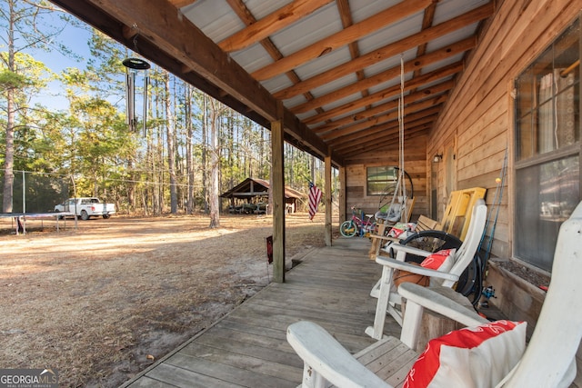 328 Willow Creek Rd, Folkston, GA 31537 - wooden deck with a trampoline