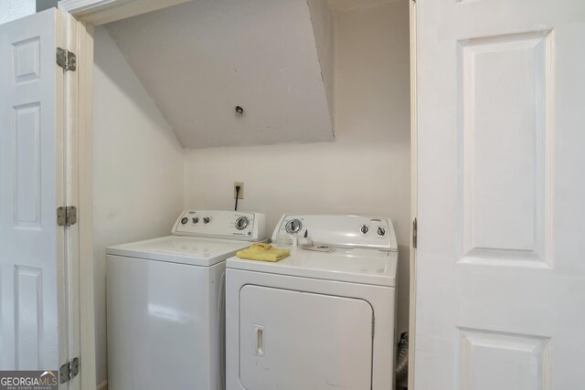 washroom featuring independent washer and dryer