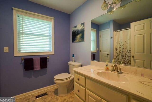 61 Amelia Ln, Blue Ridge, GA 30513 - full bathroom with toilet, vanity, and baseboards