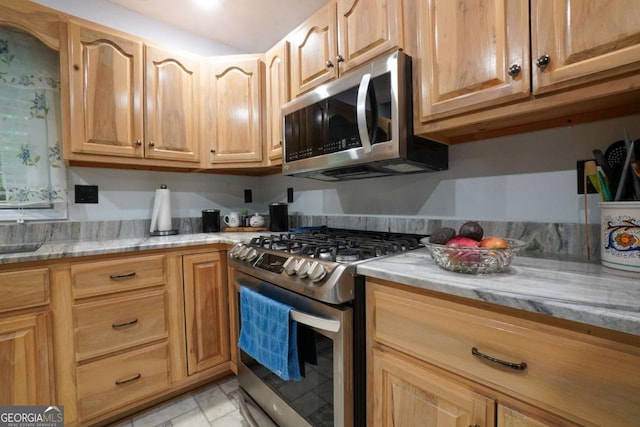 61 Amelia Ln, Blue Ridge, GA 30513 - kitchen featuring appliances with stainless steel finishes and light stone counters
