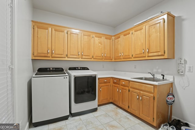 885 Kelleytown Rd, Mcdonough, GA 30252 - washroom featuring independent washer and dryer, cabinet space, and light tile patterned flooring