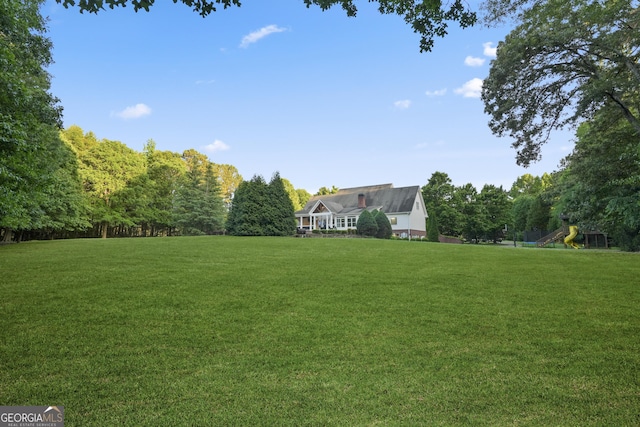 885 Kelleytown Rd, Mcdonough, GA 30252 - view of green lawn with a playground