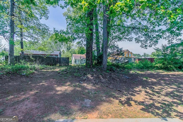 1363 To Lani Farm Rd, Stone Mountain, GA 30083 - view of yard with fence