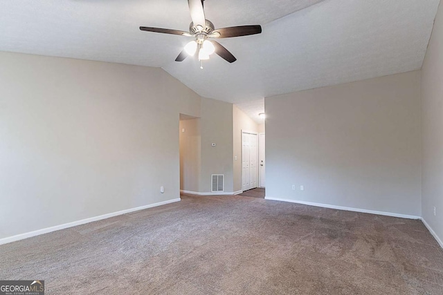 1363 To Lani Farm Rd, Stone Mountain, GA 30083 - empty room with a ceiling fan, lofted ceiling, carpet floors, and baseboards
