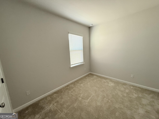 2051 Blue Sky Ave, Covington, GA 30016 - carpeted empty room with baseboards
