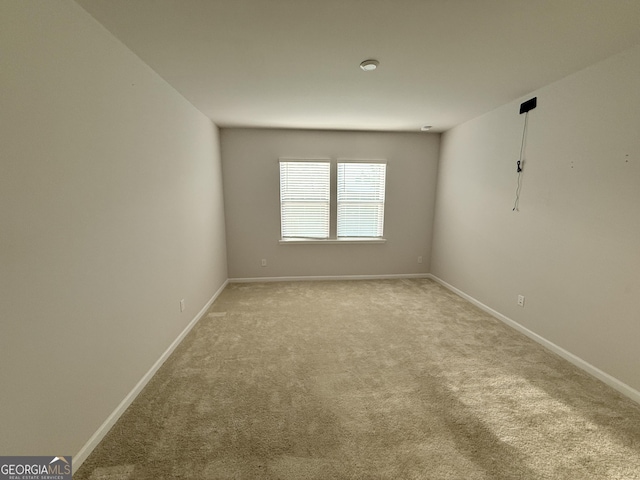 2051 Blue Sky Ave, Covington, GA 30016 - empty room featuring light colored carpet and baseboards