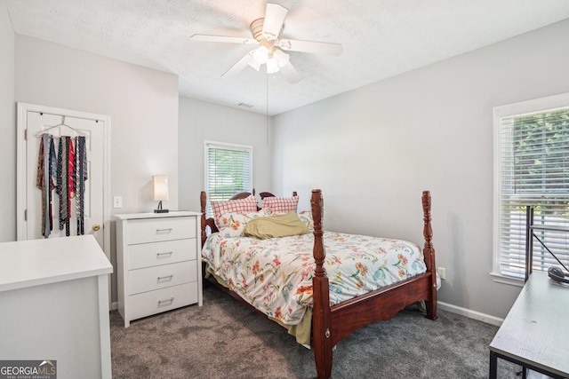 1010 Capella Creek Way, Grayson, GA 30017 - bedroom featuring dark colored carpet, a ceiling fan, and baseboards