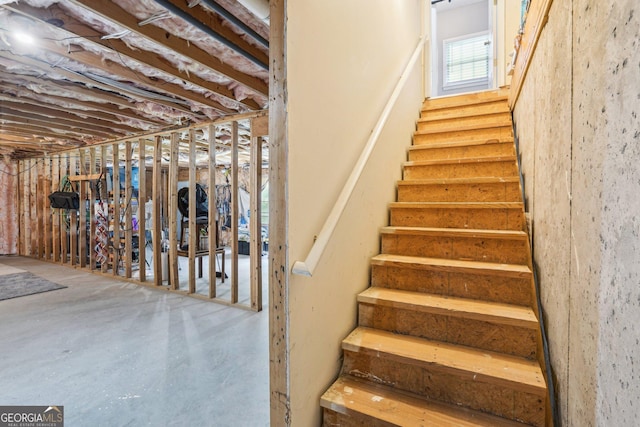 1010 Capella Creek Way, Grayson, GA 30017 - stairway with concrete floors