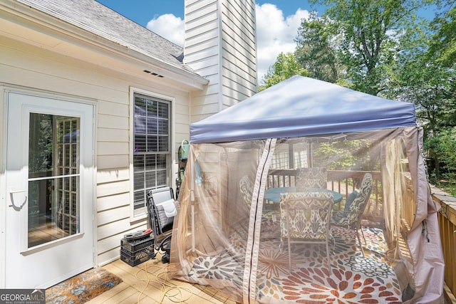 1010 Capella Creek Way, Grayson, GA 30017 - wooden terrace featuring a gazebo and outdoor dining space
