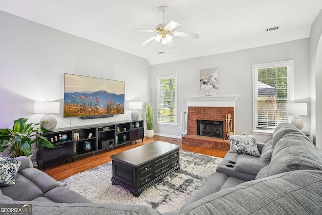 1010 Capella Creek Way, Grayson, GA 30017 - living area featuring wood finished floors, ceiling fan, a fireplace, and baseboards
