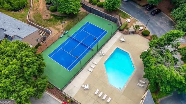 drone / aerial view of a pool area