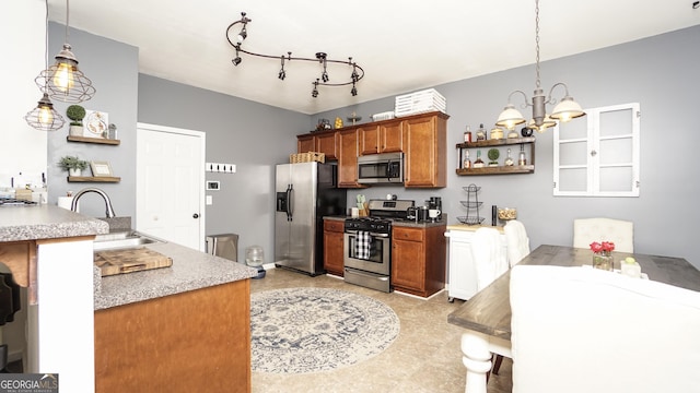 kitchen featuring stainless steel appliances, open shelves, a sink, and a chandelier