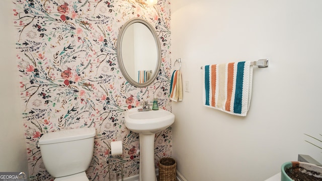 bathroom featuring toilet