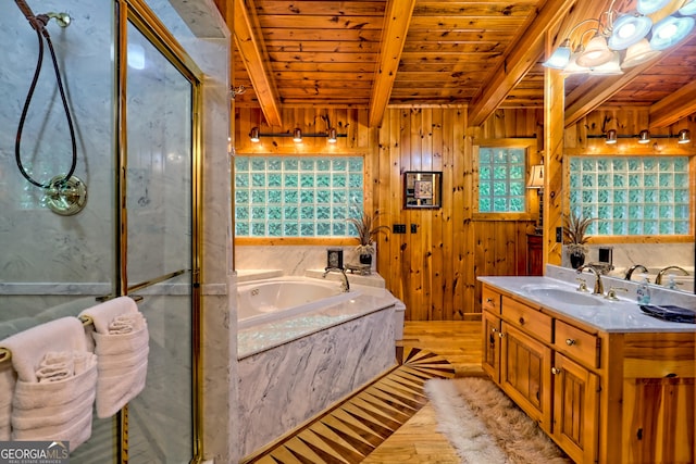 bathroom featuring wood ceiling, beam ceiling, vanity, wood finished floors, and a marble finish shower