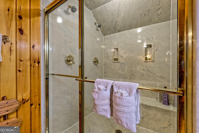 bathroom featuring a shower stall