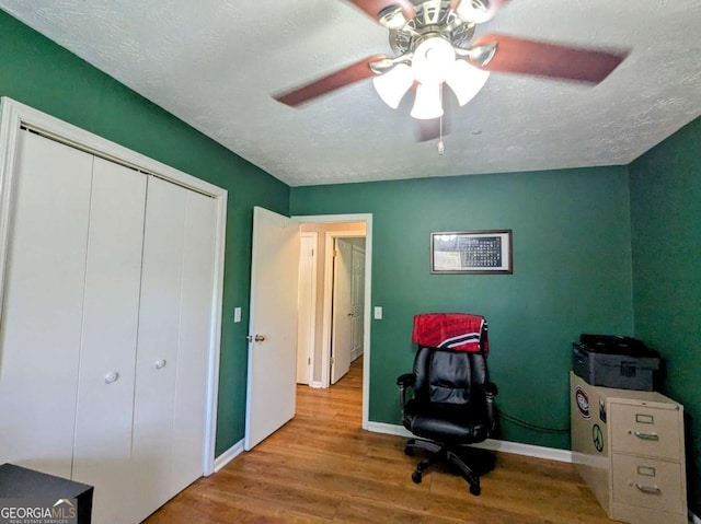 2003 Brenda Ln, Vidalia, GA 30474 - office space with wood finished floors, baseboards, a textured ceiling, and ceiling fan