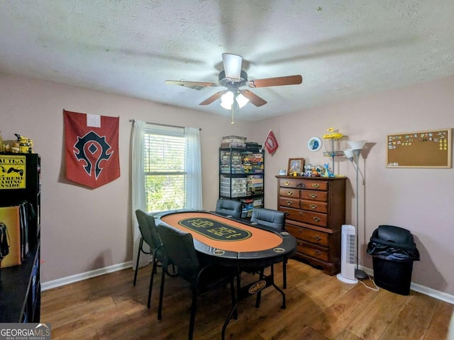 2003 Brenda Ln, Vidalia, GA 30474 - rec room featuring wood finished floors, ceiling fan, baseboards, and a textured ceiling