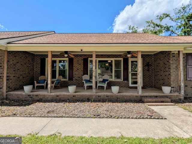 2003 Brenda Ln, Vidalia, GA 30474 - rear view of house featuring ceiling fan, brick siding, and covered porch