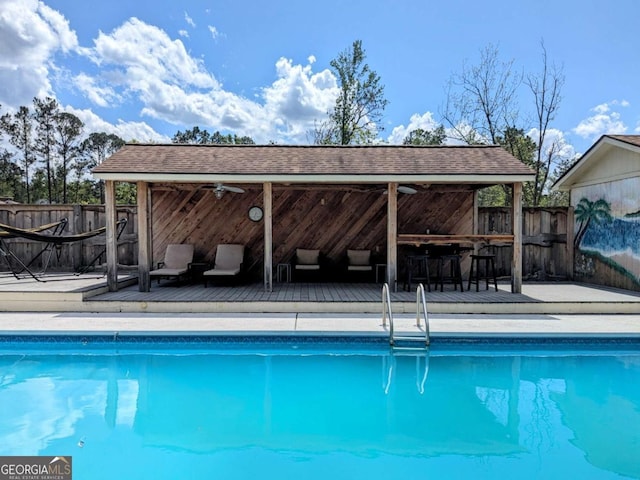 2003 Brenda Ln, Vidalia, GA 30474 - view of pool featuring a deck and fence