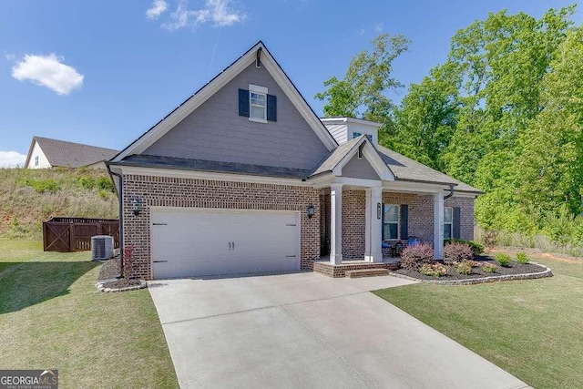 craftsman-style house featuring brick siding, concrete driveway, a garage, cooling unit, and a porch