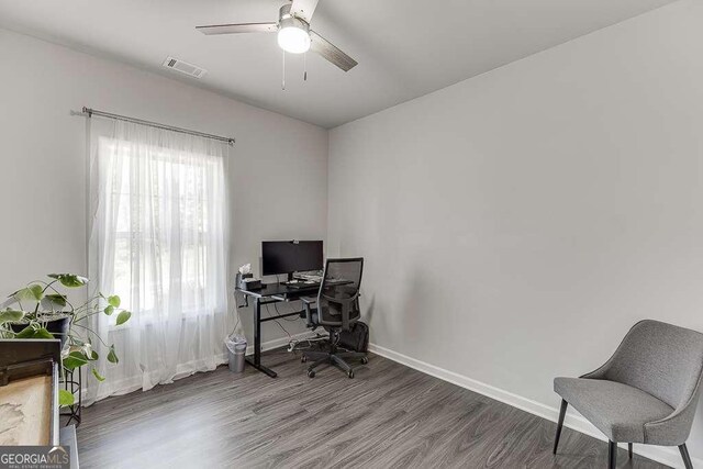 7016 Lancaster Xing, Flowery Branch, GA 30542 - office space with wood finished floors, ceiling fan, and baseboards