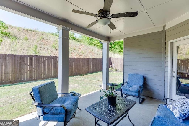 view of patio featuring ceiling fan and outdoor lounge area