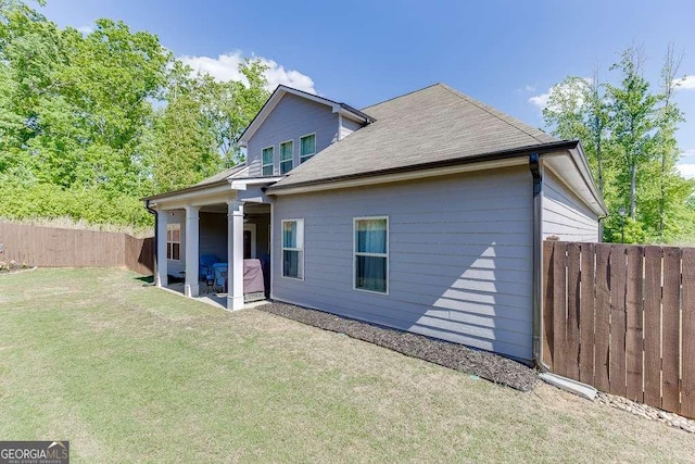 7016 Lancaster Xing, Flowery Branch, GA 30542 - rear view of house featuring a patio