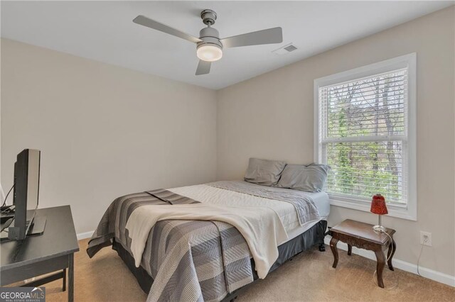 4567 Hickory Forest Dr, Acworth, GA 30102 - bedroom with light colored carpet, baseboards, and ceiling fan