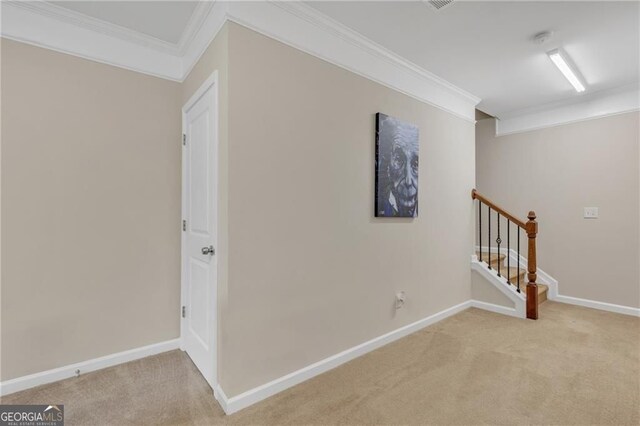 4567 Hickory Forest Dr, Acworth, GA 30102 - hallway with ornamental molding, light carpet, baseboards, and stairs