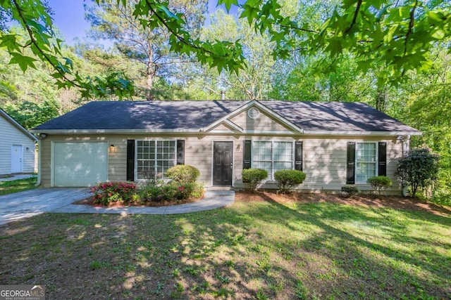 2800 Macon Dr SE, Atlanta, GA 30354 - ranch-style home with a garage, concrete driveway, and a front yard