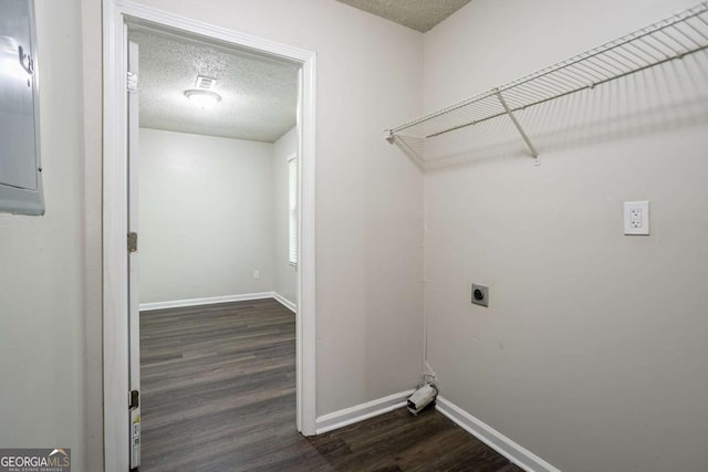 2800 Macon Dr SE, Atlanta, GA 30354 - washroom with electric dryer hookup, a textured ceiling, dark wood-style floors, and baseboards