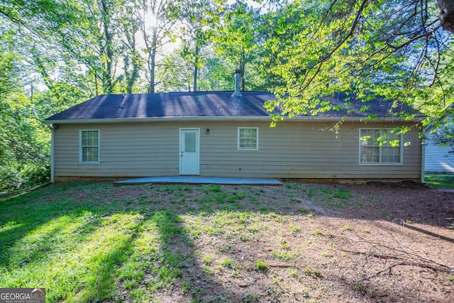 2800 Macon Dr SE, Atlanta, GA 30354 - rear view of property featuring a patio area and a lawn