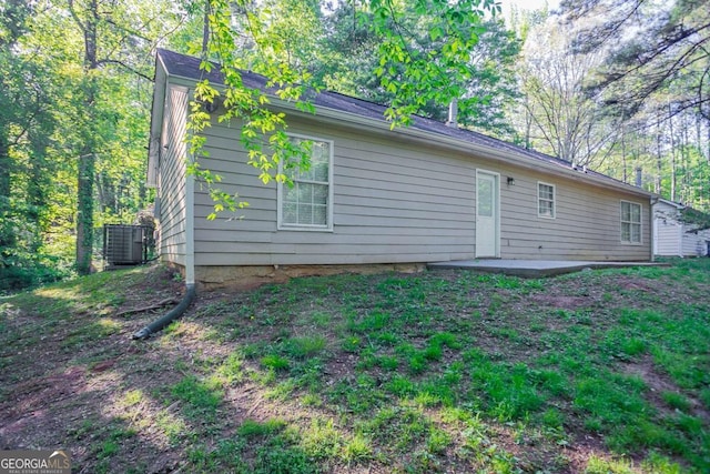 2800 Macon Dr SE, Atlanta, GA 30354 - rear view of house with central AC and a patio