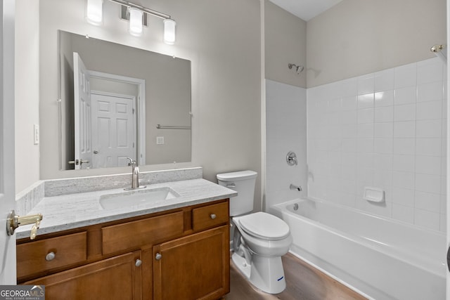 1429 Kentmire Ct, Locust Grove, GA 30248 - full bath with shower / bath combination, wood finished floors, toilet, and vanity
