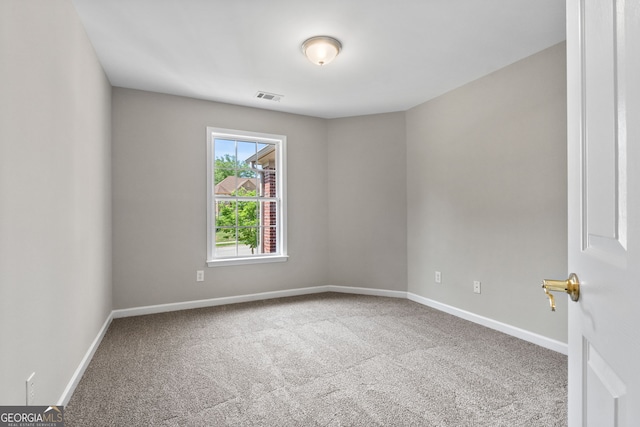1429 Kentmire Ct, Locust Grove, GA 30248 - carpeted spare room featuring baseboards