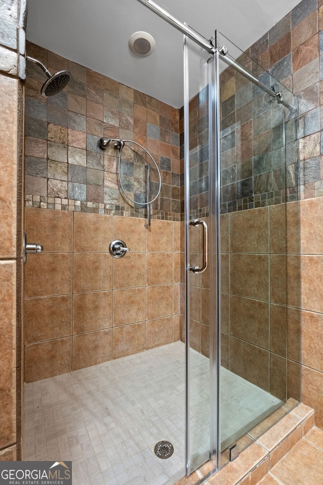 1429 Kentmire Ct, Locust Grove, GA 30248 - bathroom with a stall shower