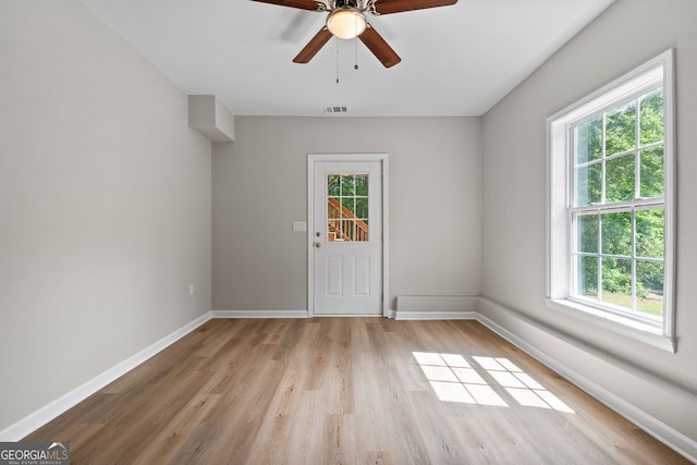 1429 Kentmire Ct, Locust Grove, GA 30248 - unfurnished room featuring light wood-style floors, baseboards, and ceiling fan