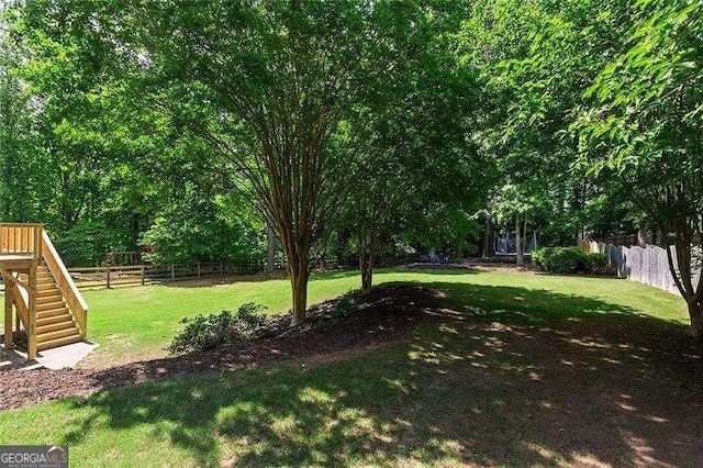 view of yard with stairway