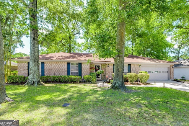 single story home with brick siding, a garage, driveway, and a front yard