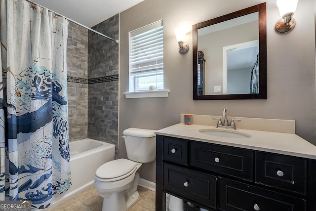 full bathroom featuring toilet, vanity, baseboards, tile patterned flooring, and shower / tub combo with curtain