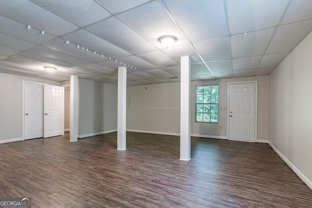 1076 Plantation Blvd SE, Conyers, GA 30094 - basement featuring a paneled ceiling and wood finished floors
