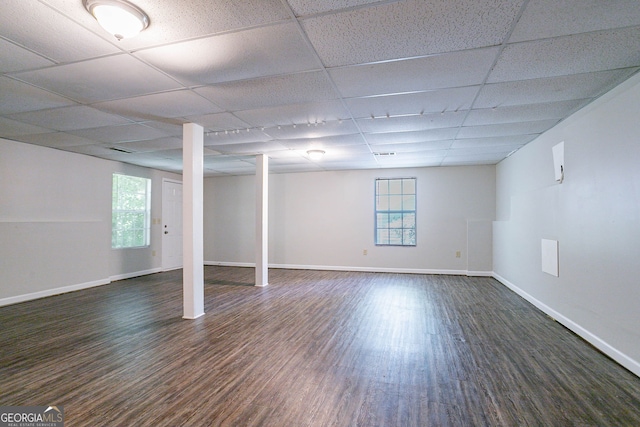 1076 Plantation Blvd SE, Conyers, GA 30094 - basement with a drop ceiling and dark wood-style flooring