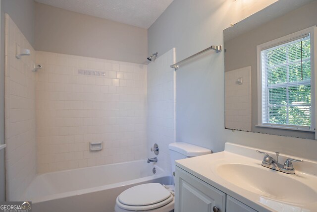 1076 Plantation Blvd SE, Conyers, GA 30094 - unfurnished bedroom featuring a textured ceiling, carpet floors, baseboards, and a ceiling fan