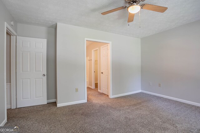 1076 Plantation Blvd SE, Conyers, GA 30094 - spacious closet with carpet flooring