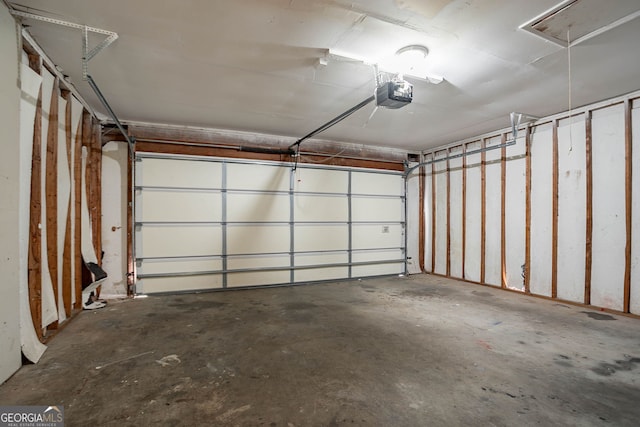 1076 Plantation Blvd SE, Conyers, GA 30094 - garage featuring a garage door opener