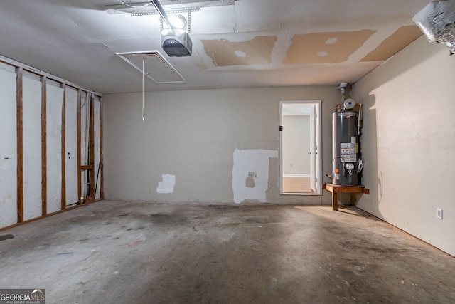 1076 Plantation Blvd SE, Conyers, GA 30094 - garage featuring water heater and a garage door opener