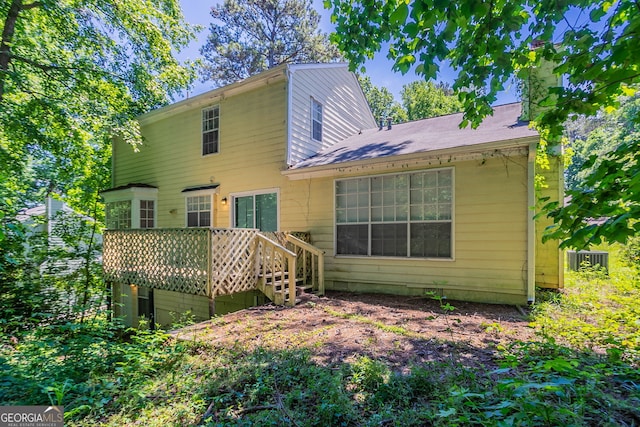 1076 Plantation Blvd SE, Conyers, GA 30094 - rear view of property featuring a deck