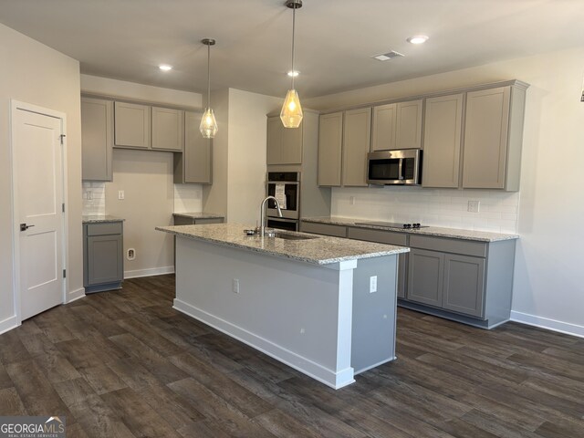 5314 Tolar Rd Unit 23, South Fulton, GA 30213 - kitchen with gray cabinetry, stainless steel microwave, a sink, black electric stovetop, and recessed lighting
