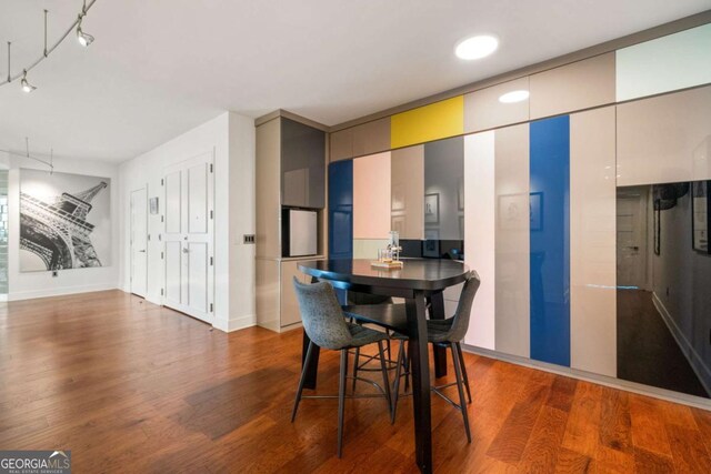 20 10th St NW Unit 2003, Atlanta, GA 30309 - dining area with wood finished floors and baseboards